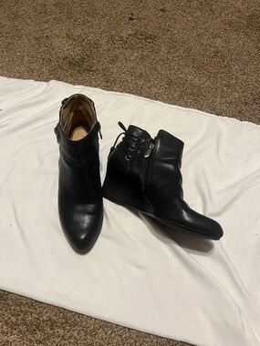 Adrienne Vittadini black leather booties. Zip closure   Never worn